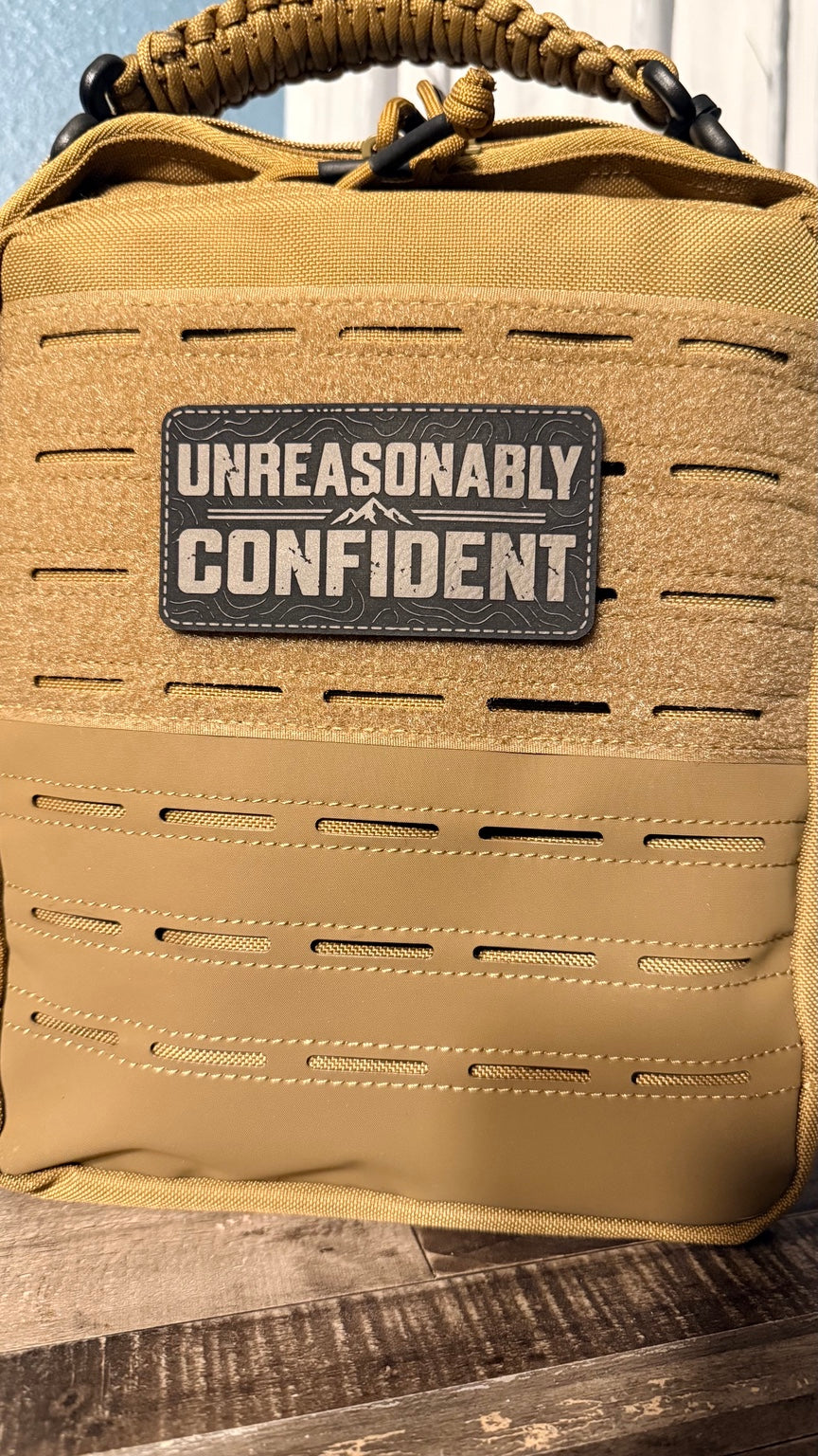Unreasonably Confident morale patch mounted on a tactical pack